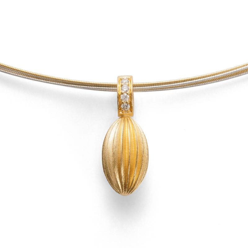 sterling silver gold plated sand blasted pendant with white topaz accents