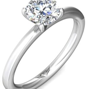 Stunning and simple, this FlyerFit solitaire engagement ring is designed with a sleek edge band t...